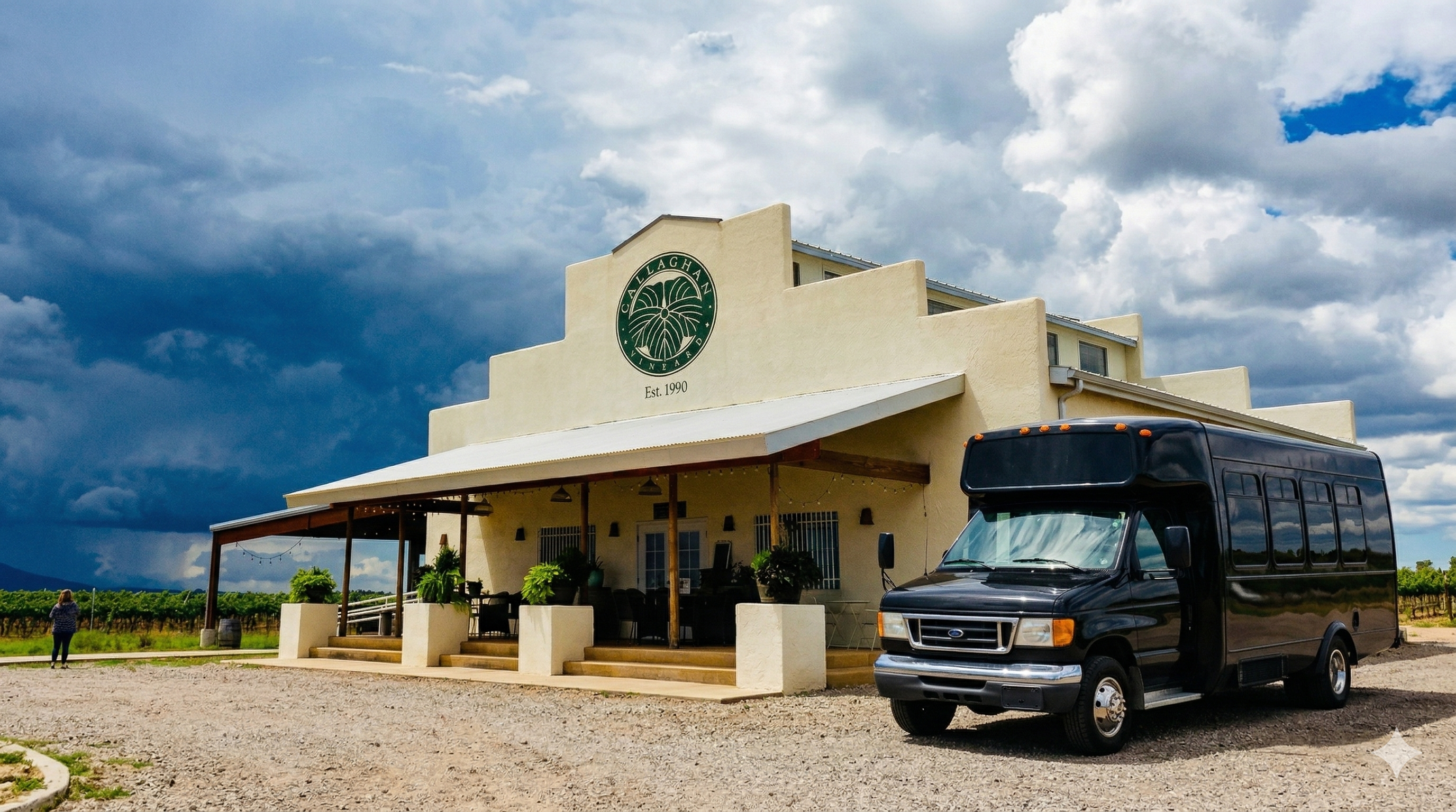 Black party bus at Callaghan Winery Arizona wine tour