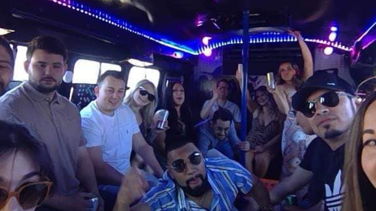 Group celebration colorful interior party bus Tucson