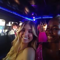 Two girls in prom dresses smiling Tucson